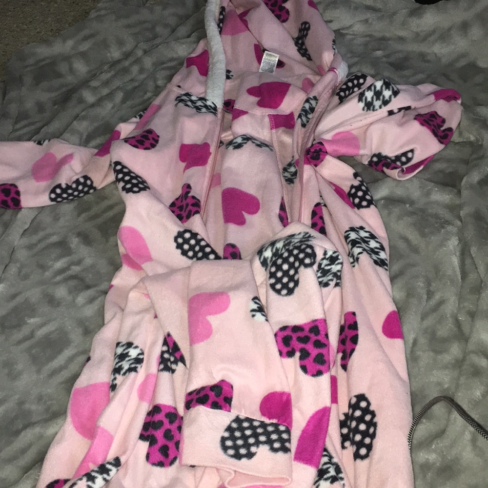 Pink onesie with hearts